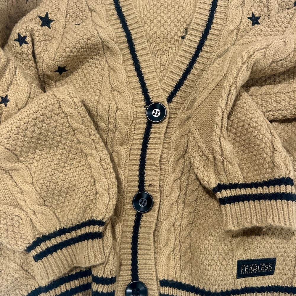 Official Taylor Swift Fearless TV Cardigan, Tan Cable Knit with Black Stars